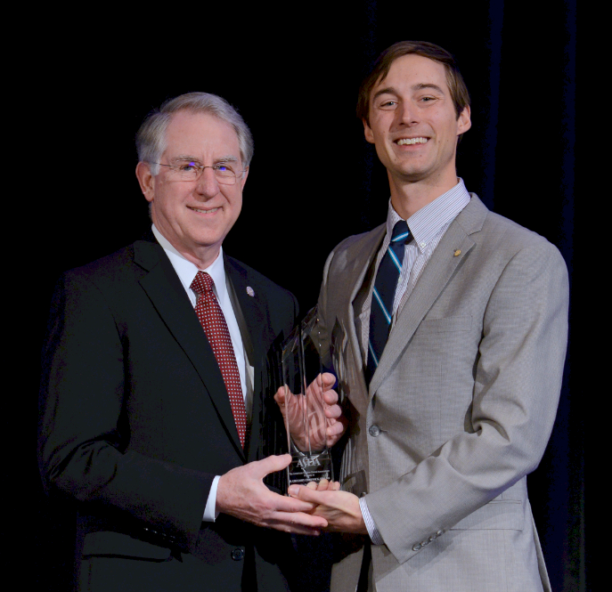 Dr. Gregory Chadwick accepting the 2016 Paragon Award